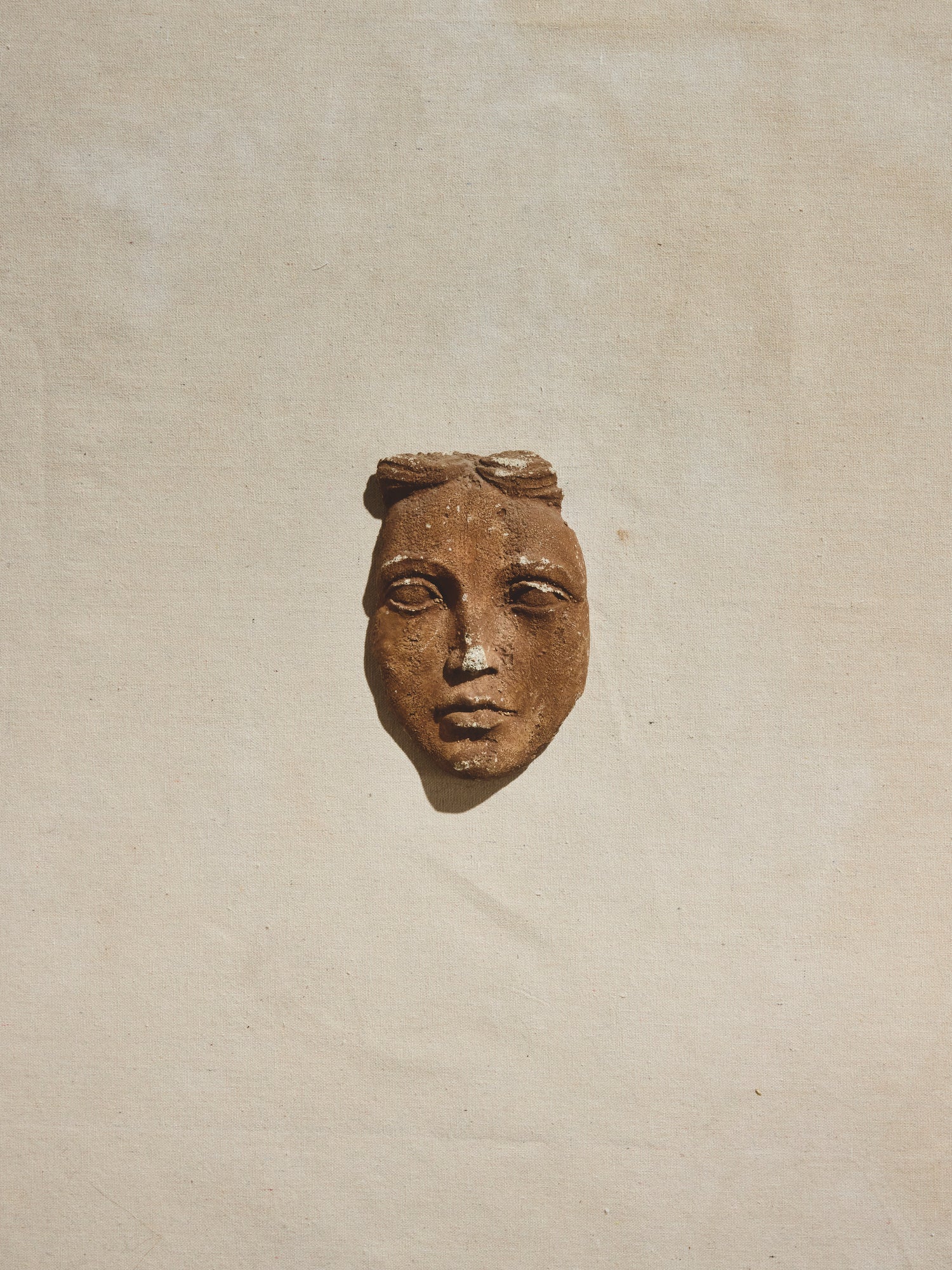 Clay Face Sculpture