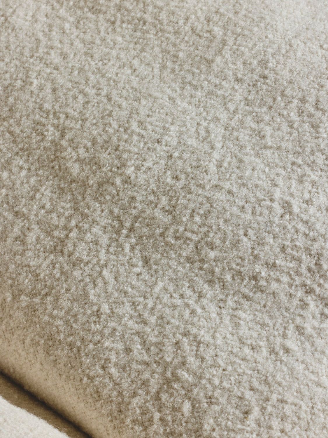 Close up of the crema fabric slip cover.