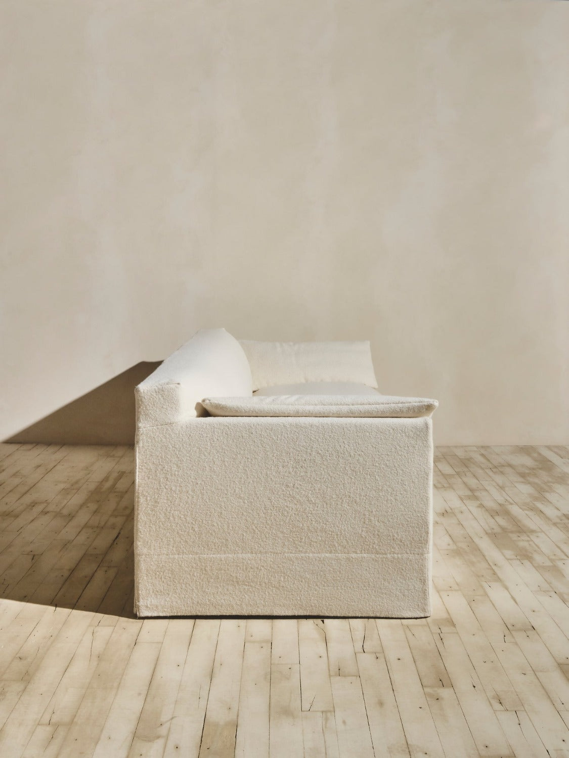 Side view of the Bromley Sofa in our crema fabric.