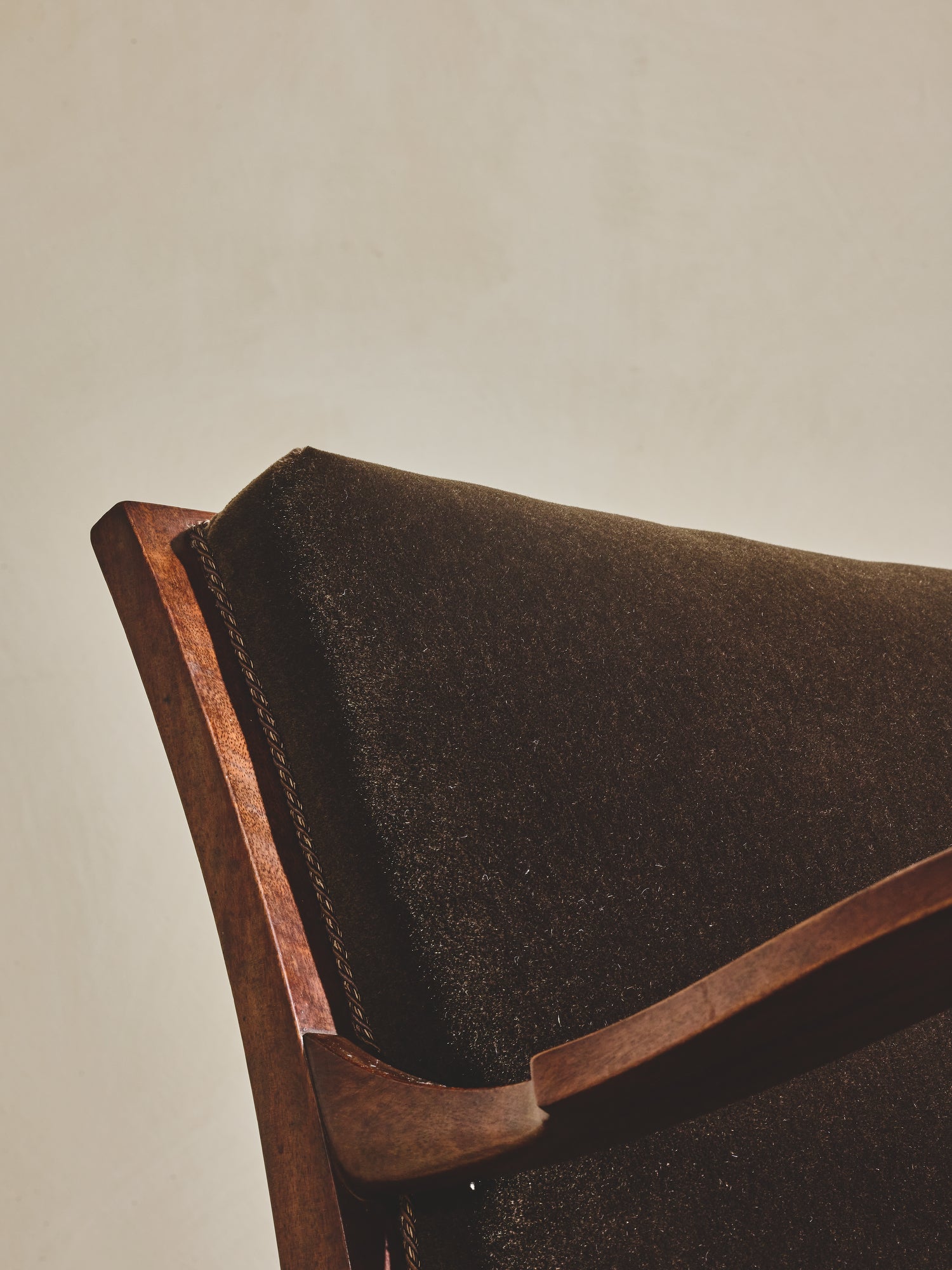 1930's brown Danish art décor armchair with thin curved details.