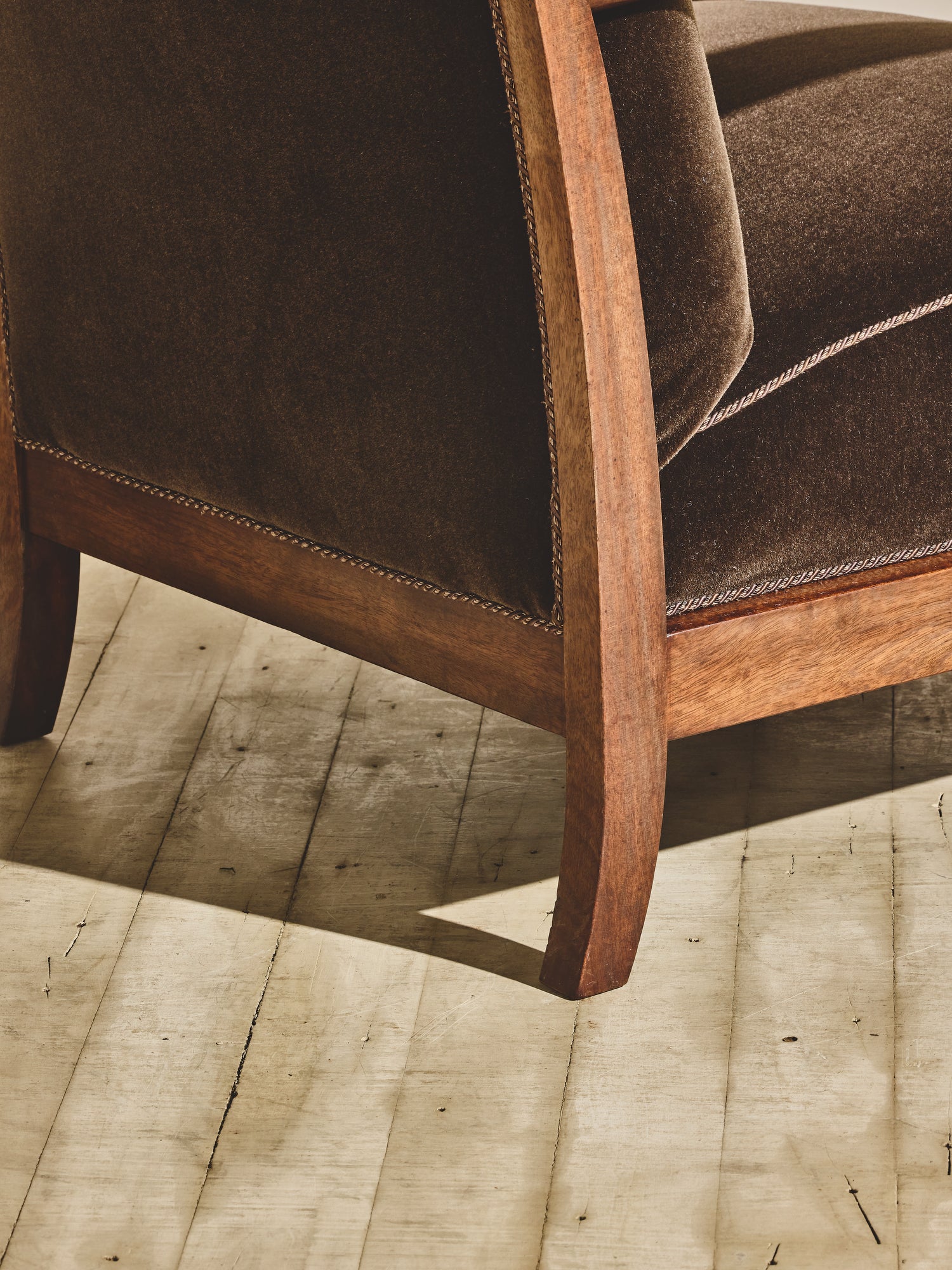 1930's brown Danish art décor armchair with thin curved details.