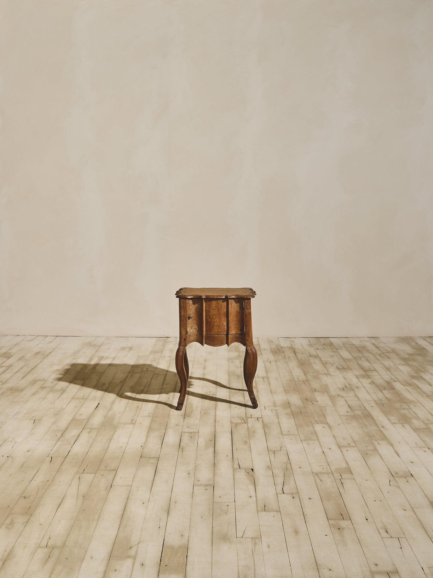 Baroque solid oak side table with fluted sides, wavy oak grain pattern, and hand sculpted XV French style legs.