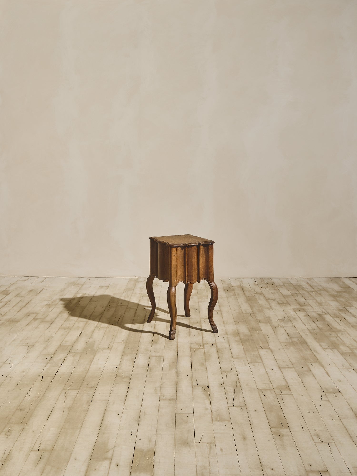 Baroque solid oak side table with fluted sides, wavy oak grain pattern, and hand sculpted XV French style legs.