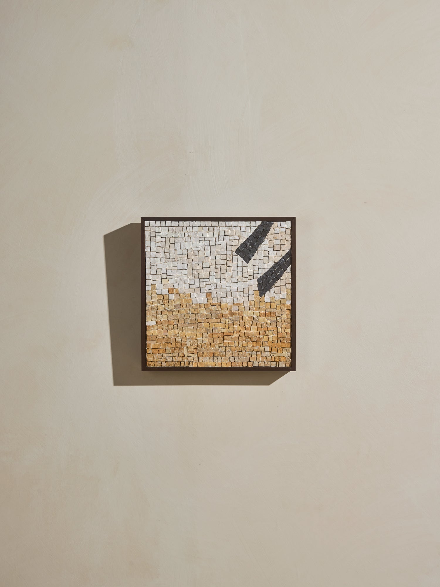Mosaic square stone art piece with yellow, off white and black details and wooden framing.
