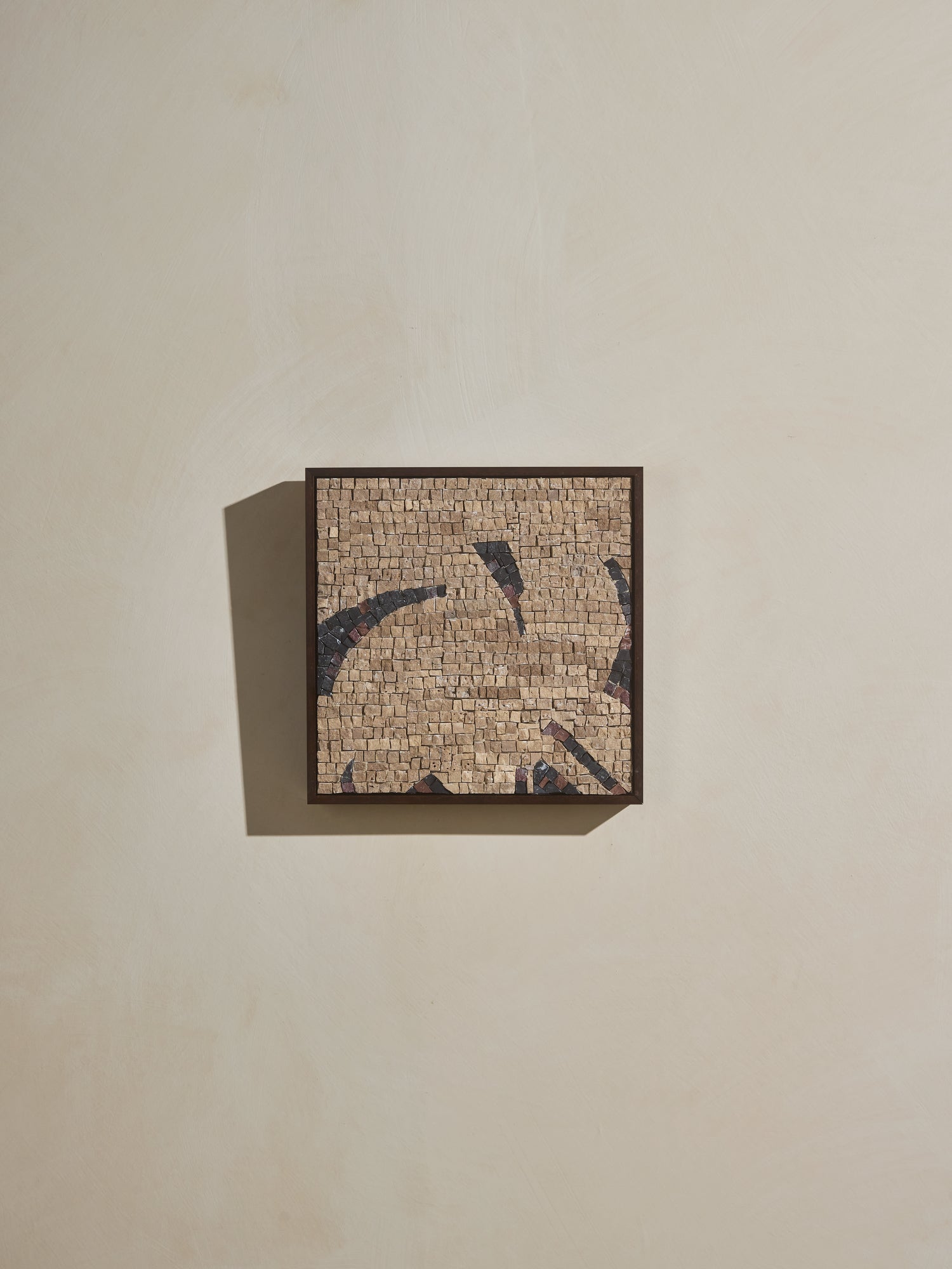 Mosaic square stone art piece with beige and black details and wooden framing.