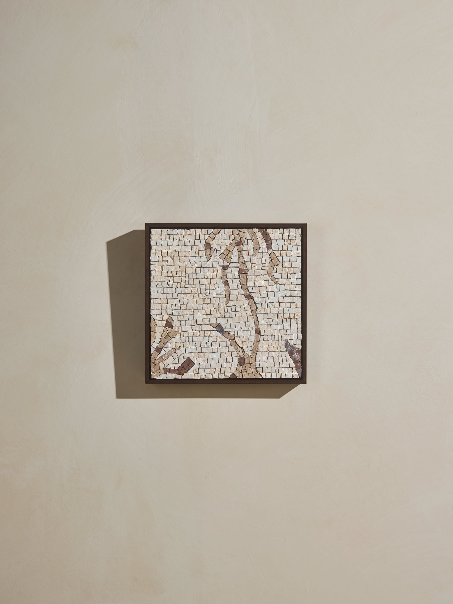 Mosaic square stone art piece with off white and beige details and wooden framing.