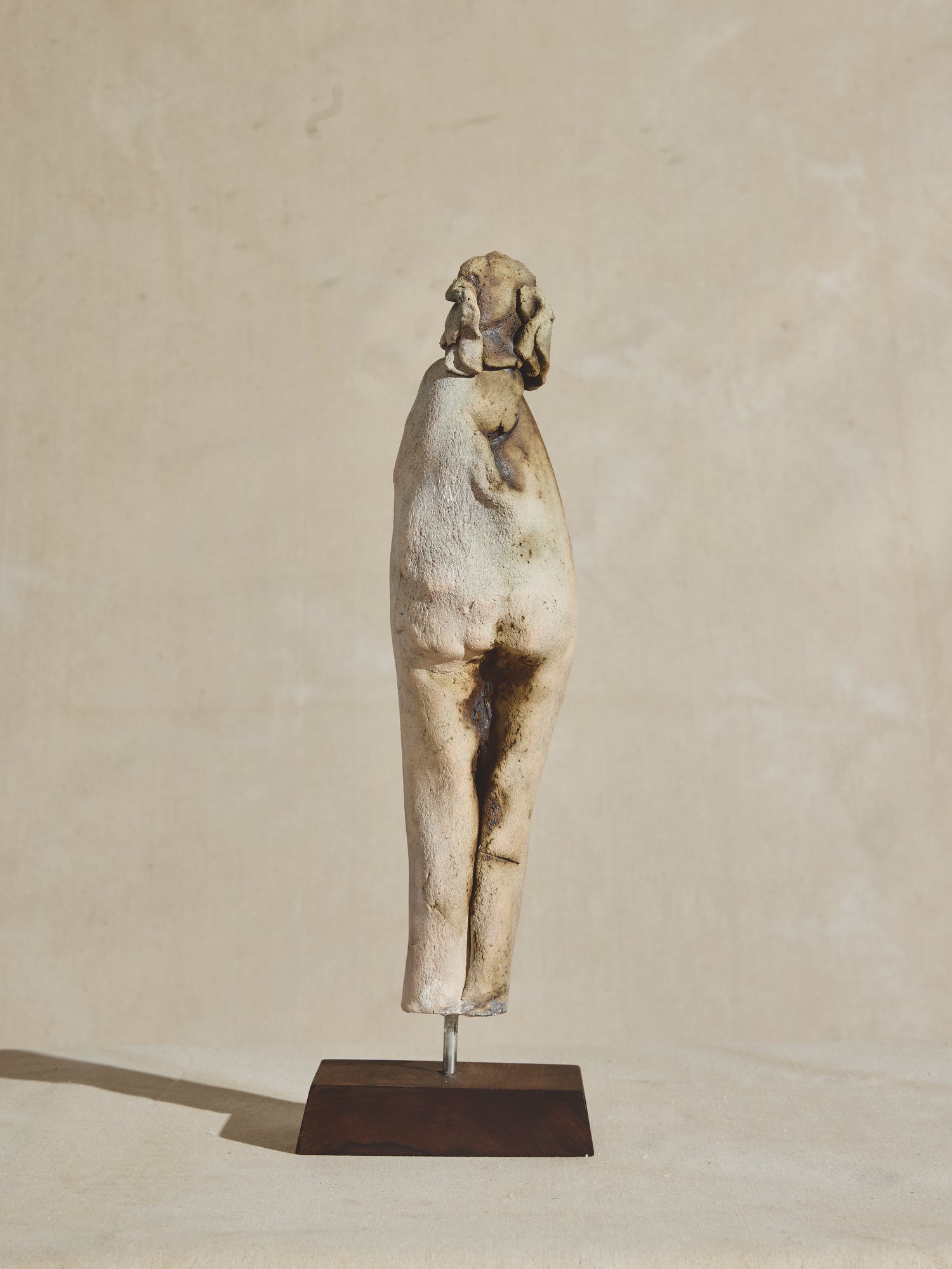 Abstract ceramic sculpture figure on wood pedestal, artist OZwaig