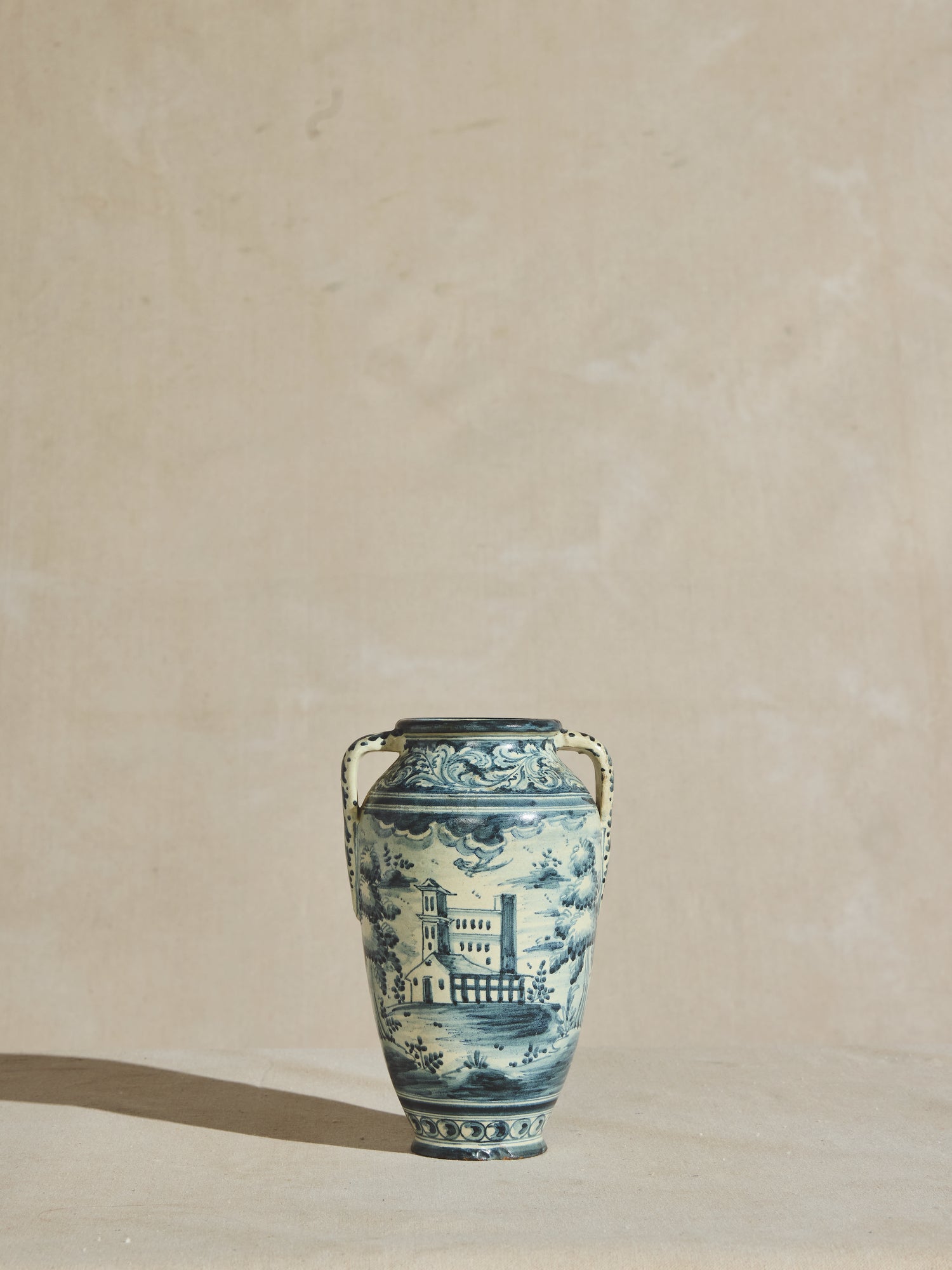 Hand painted clay pottery vase, stamped with the mark of Alaer Niveiro.