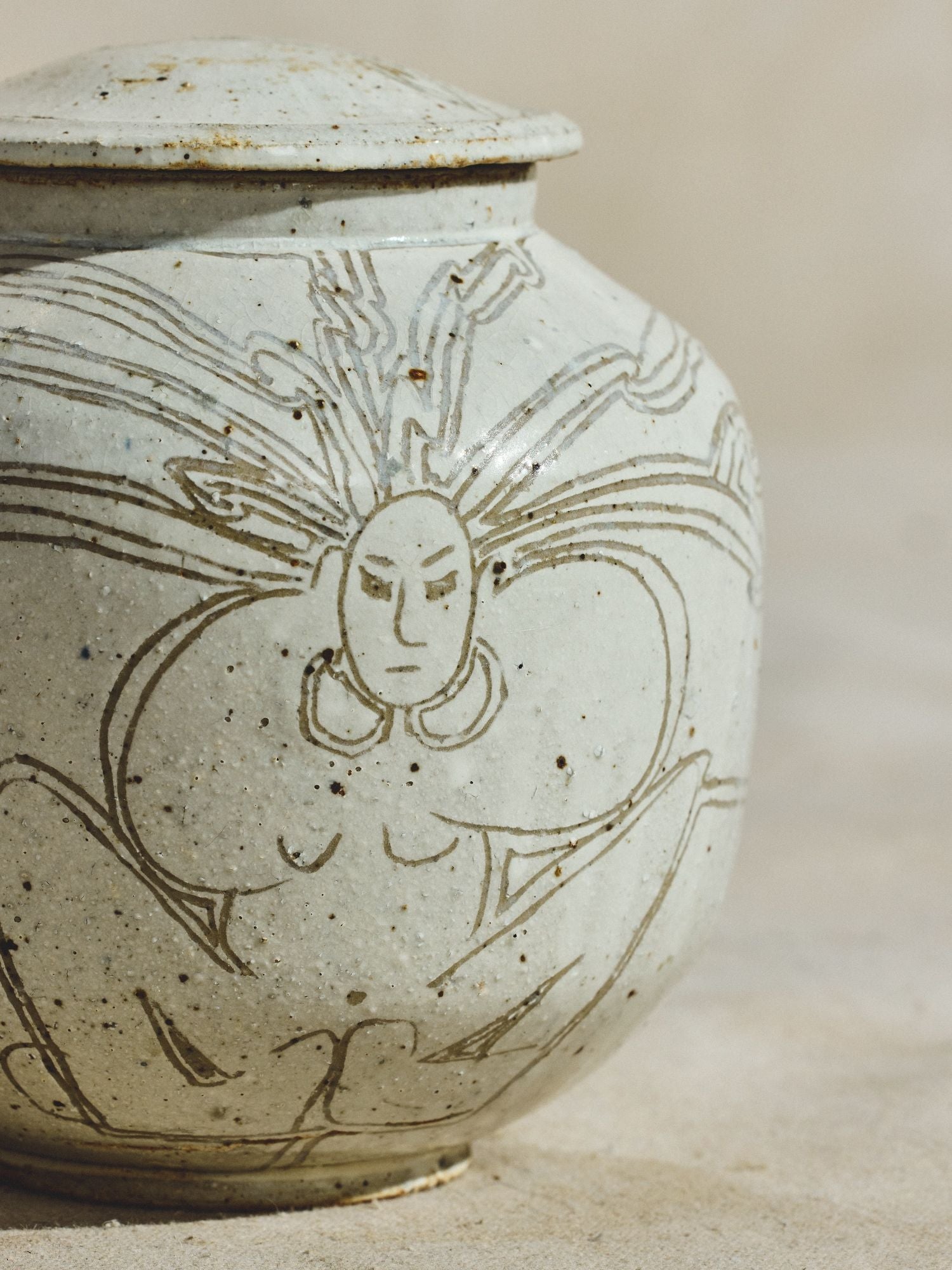 Incised Stoneware Bird Jar