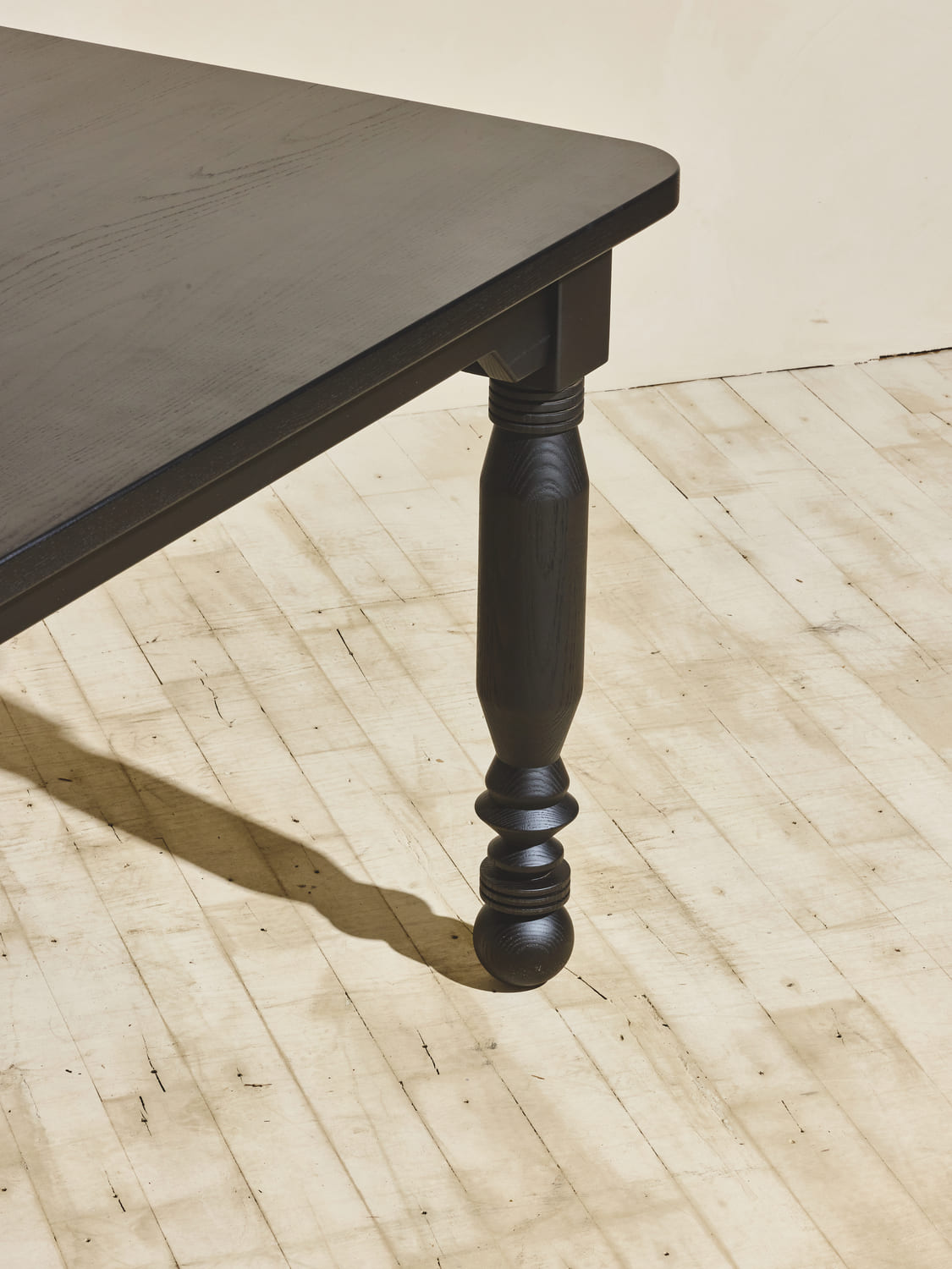 Close up of the natural finish stained oak wood grain that makes the NBL Coffee Table.