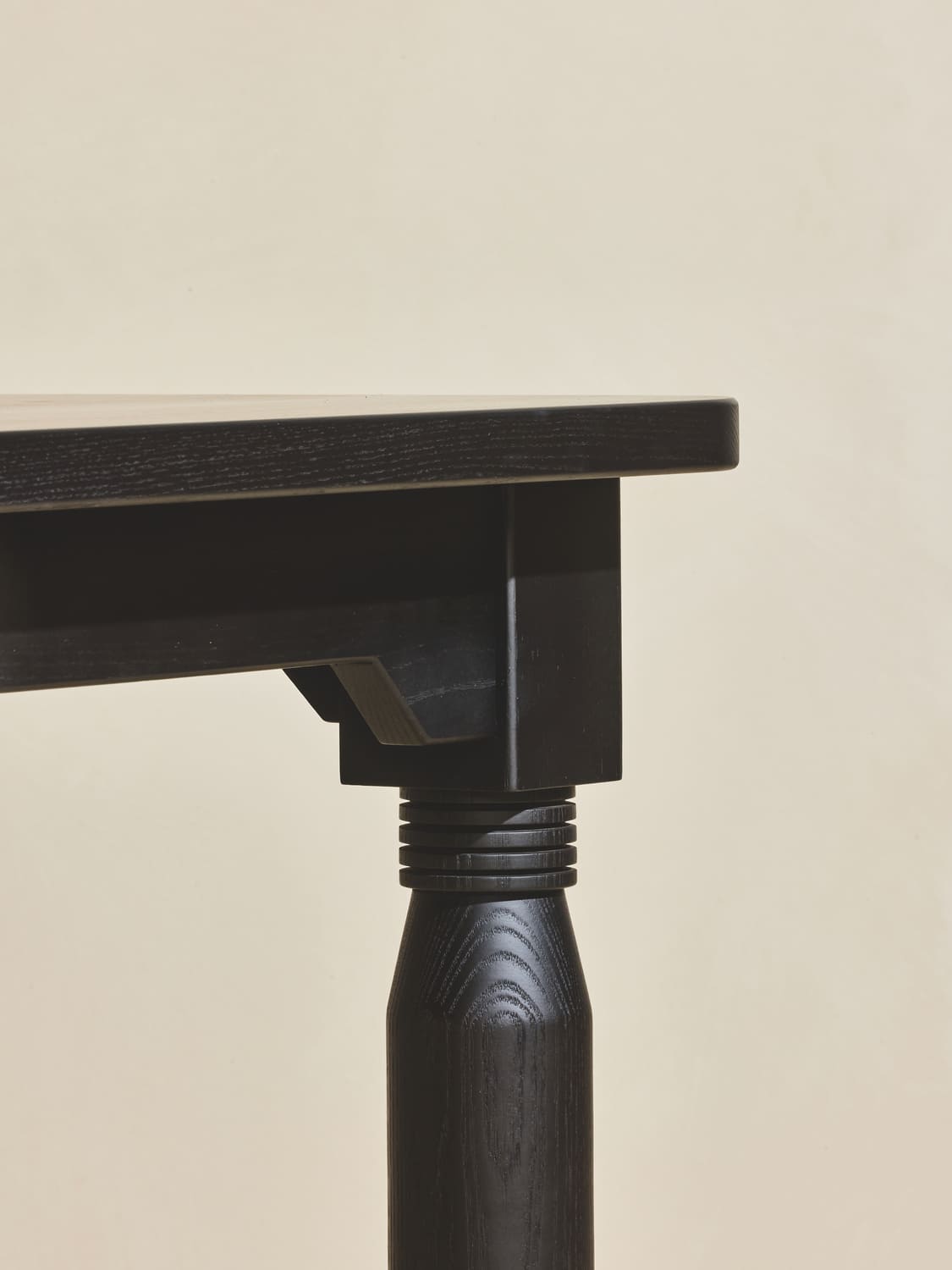 Close up of the natural finish stained oak wood grain that makes the NBL Coffee Table.