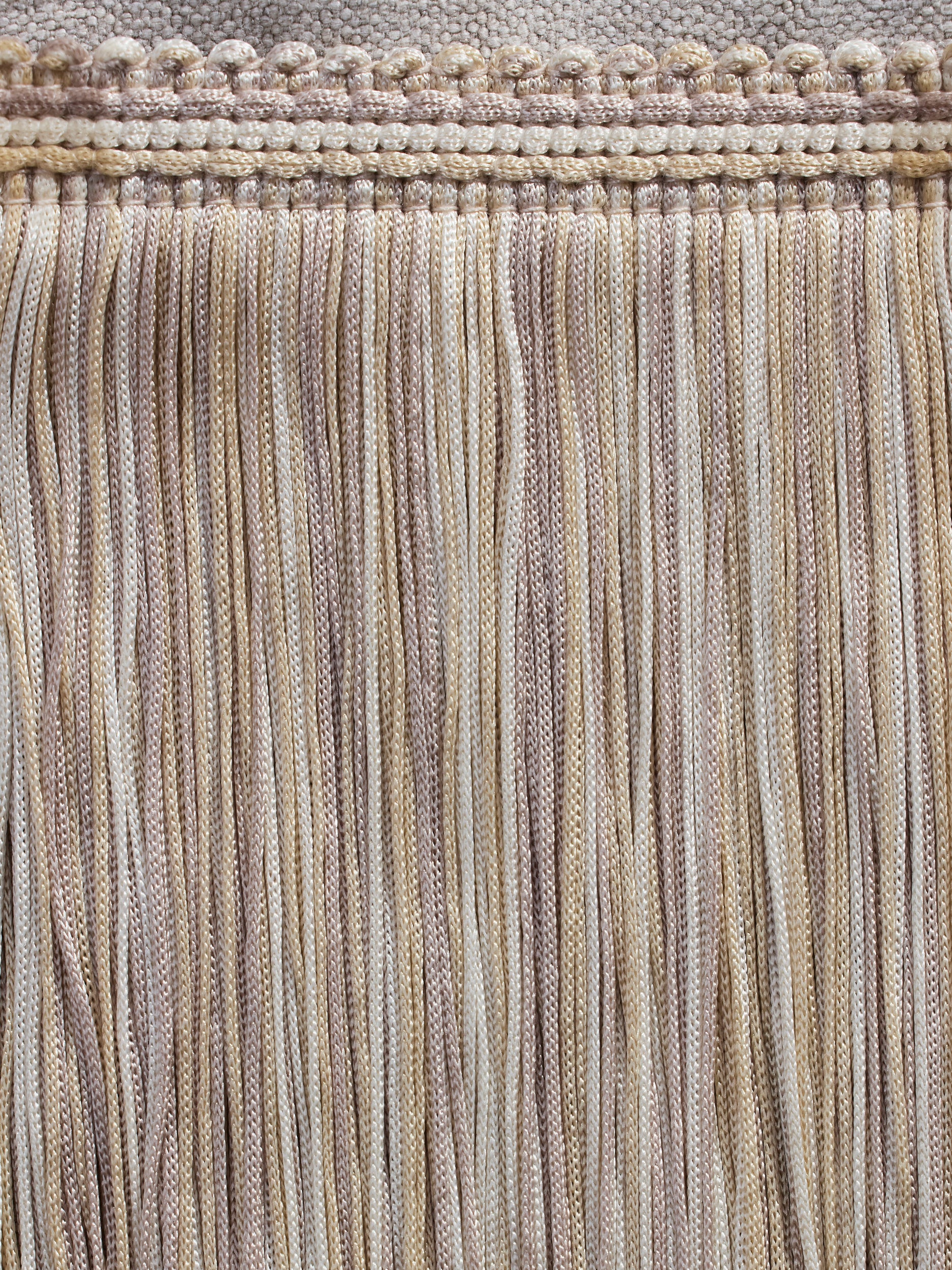 Close up of fringe detailing.