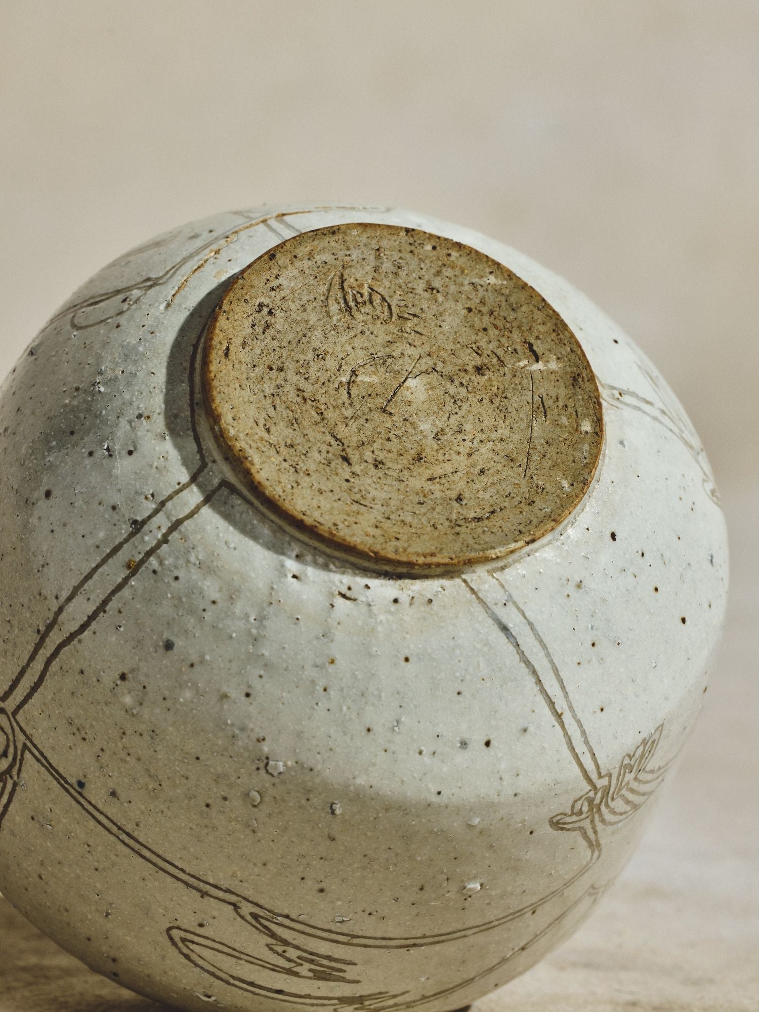 Incised Stoneware Bird Jar
