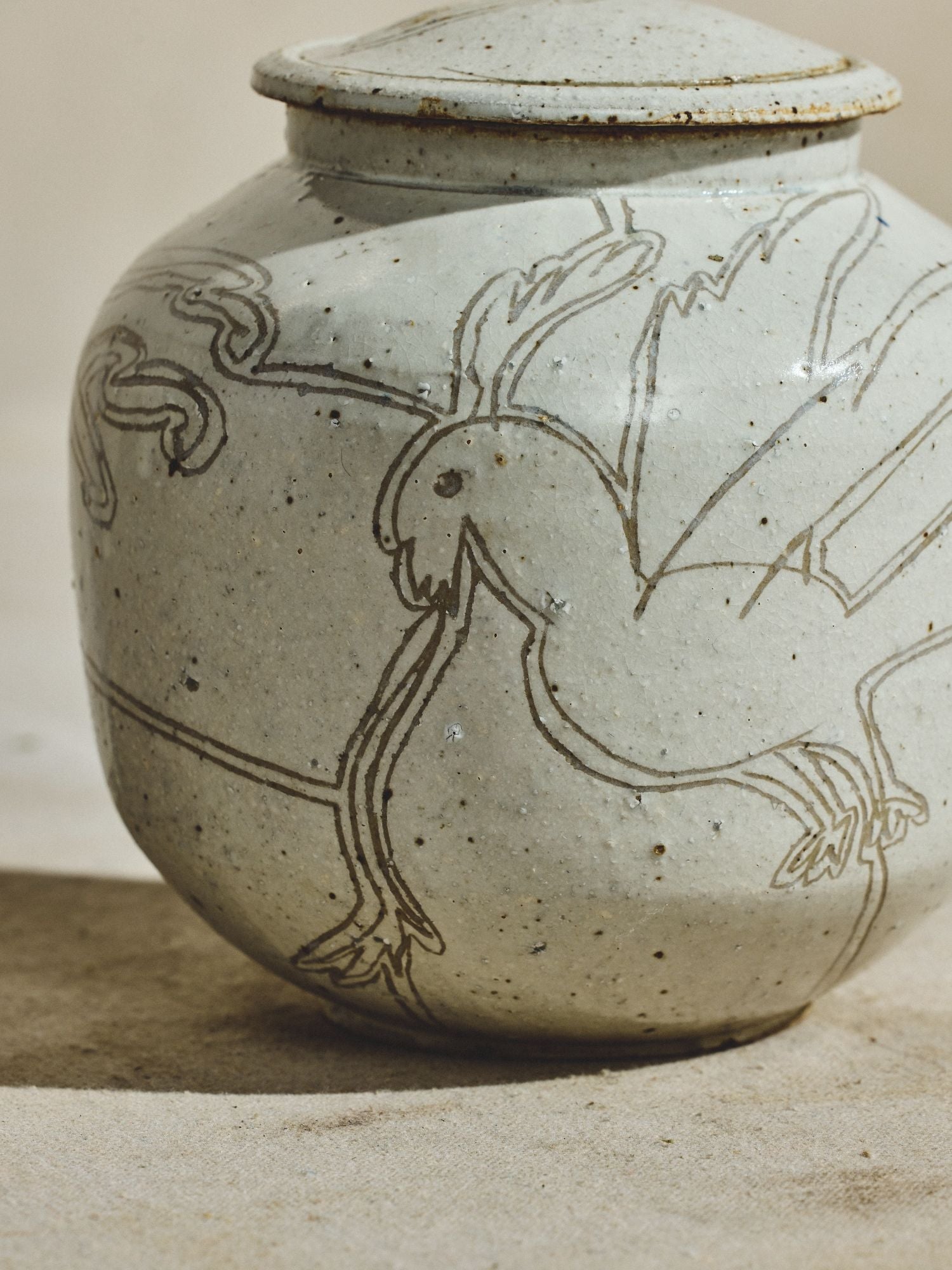 Incised Stoneware Bird Jar