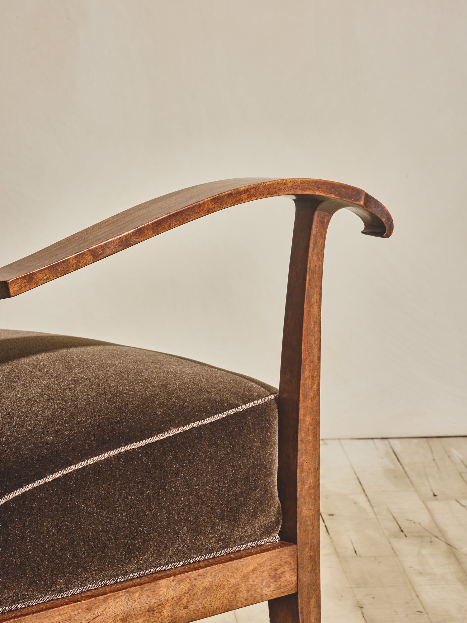 1930's brown Danish art décor armchair with thin curved details.
