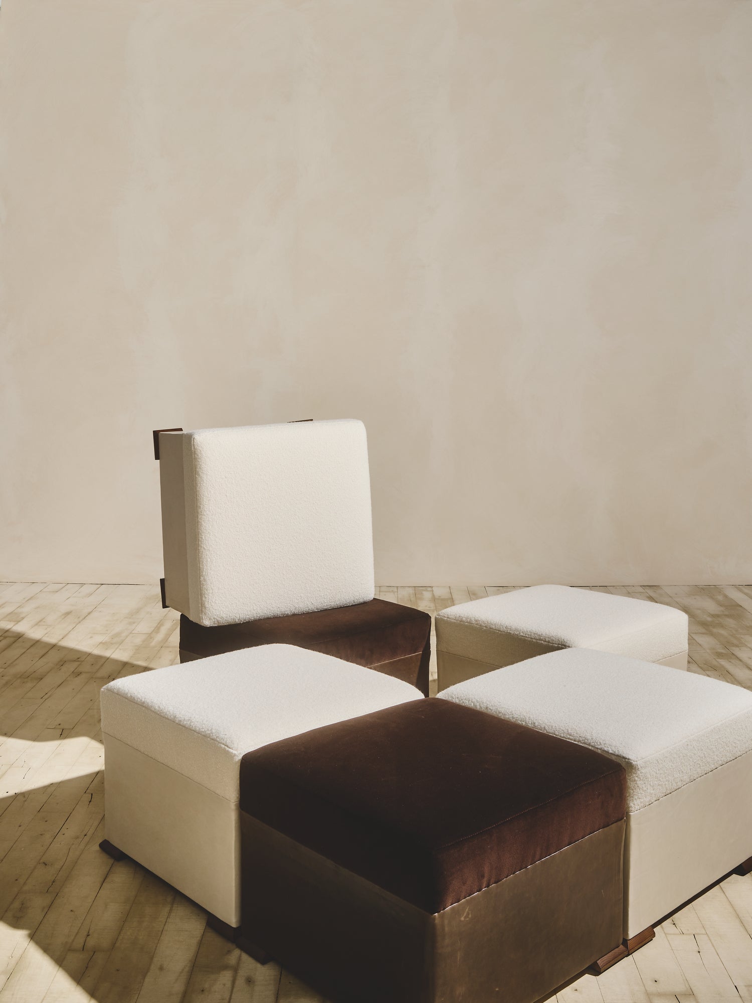 Brutalist style Bromley Ottoman pieces grouped together in cigar and crema fabric.