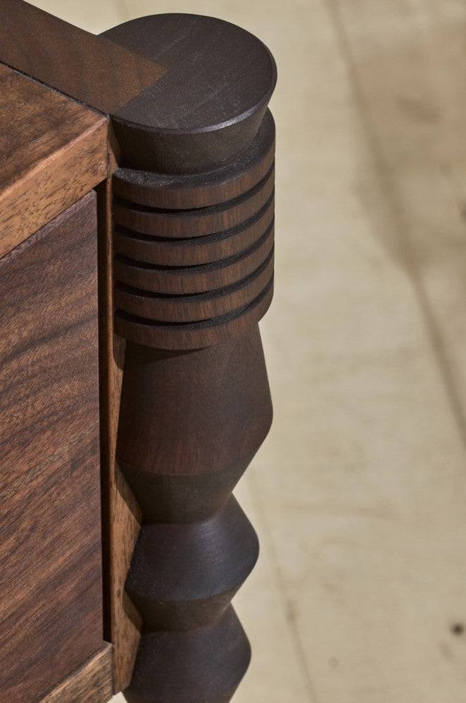 Close up of geometric leg turnings in authentic finish from Disc Side Table