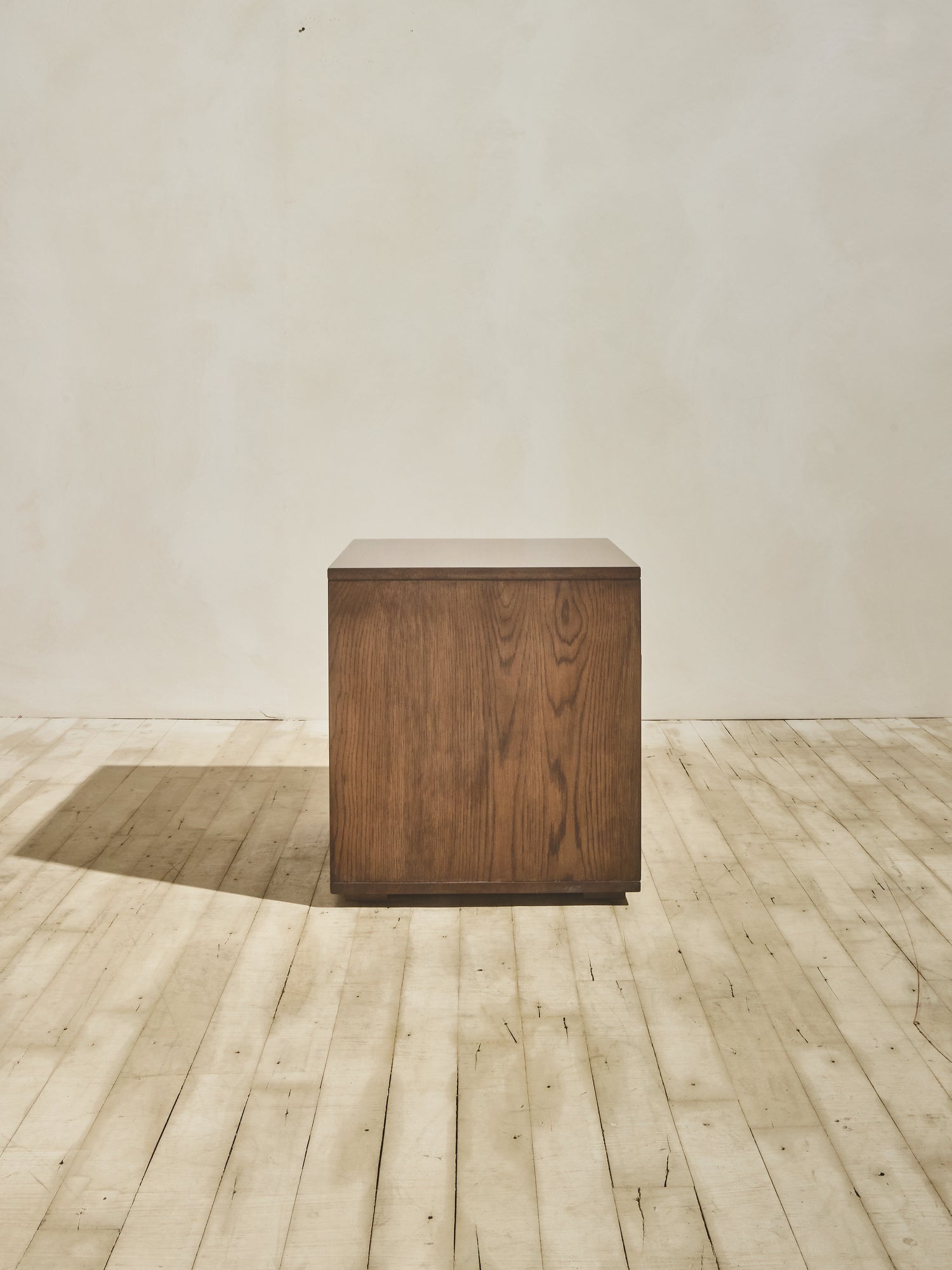 Side view of white oak grain, minimalist Ghent Side Table in natural finish.