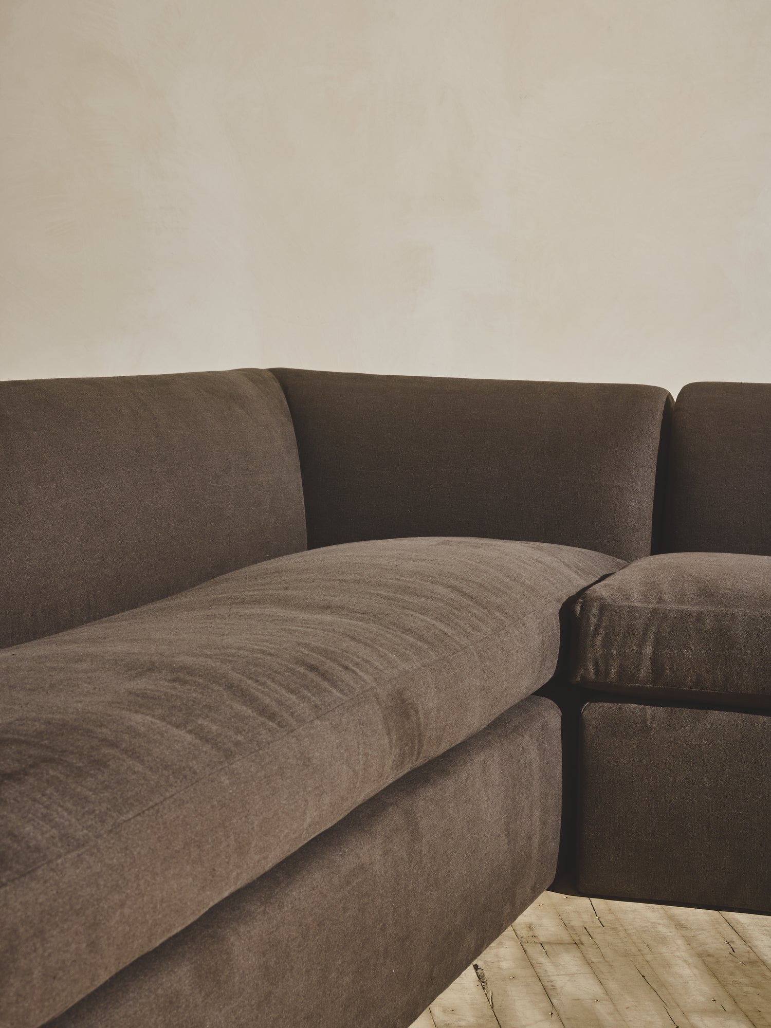 Close up of the comfort seating upholstered fabric on the Sabi Sectional.