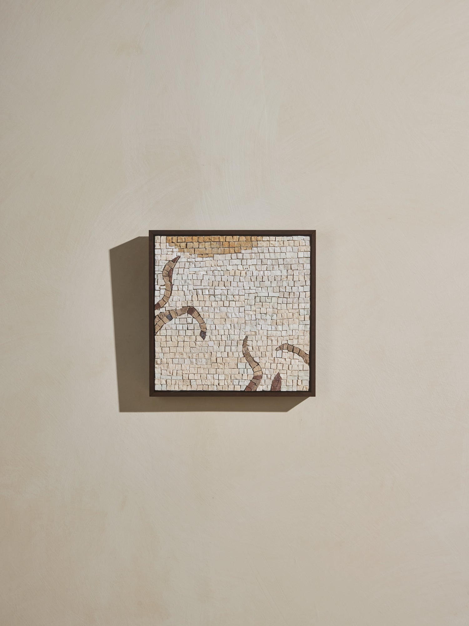 Mosaic square stone art piece with yellow, off white and beige details and wooden framing.