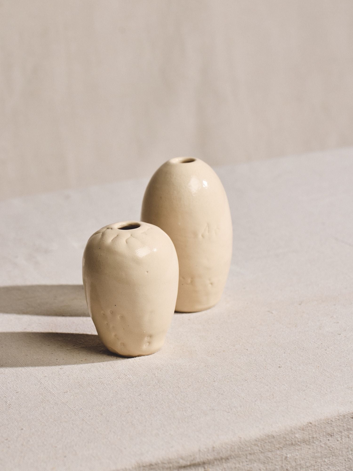 Pair of Cream Glazed Mini Vases