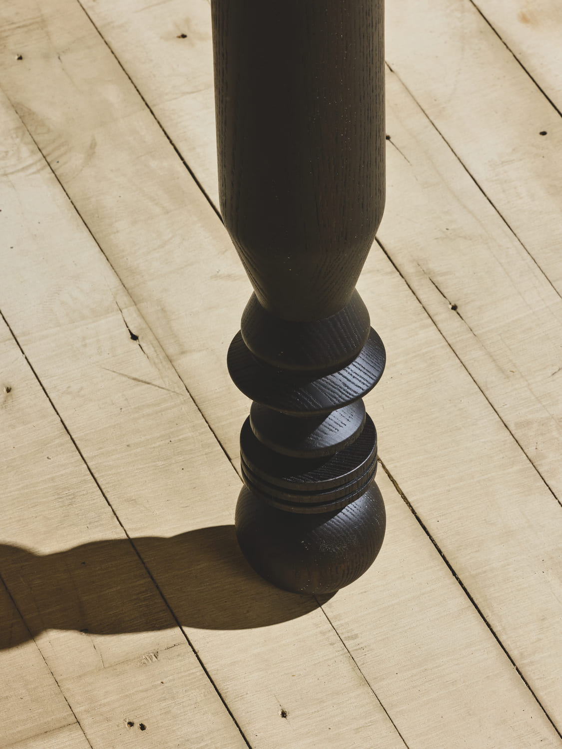 Close of of the unique leg detailing in natural finish on the NBL Coffee Table.