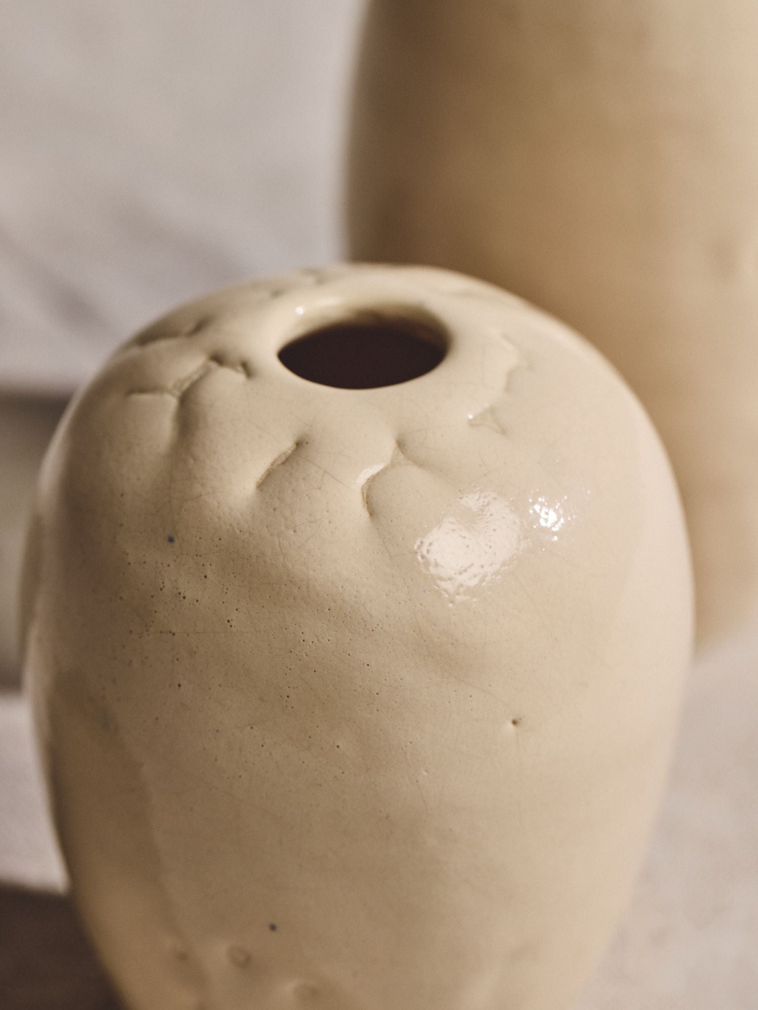 Pair of Cream Glazed Mini Vases